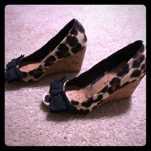 Peep toe cheetah wedges